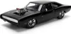 A black 1970 Dodge Charger R/T model car with a supercharger on the hood, shown from a three-quarter front angle on a white background. Náhľad obrázku produktu