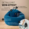 A blue beanbag chair with various features highlighted by text overlays and a small inset image of a washing machine. Voir les images du produit