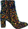 A single black ankle boot covered in colorful sequins is shown against a white background. Produktbild-Vorschau