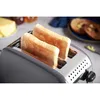 A close-up shot of a gray toaster with two slices of toast inside. Voir les images du produit