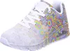 A single Skechers sneaker with a colorful, abstract pattern. Produktbild-Vorschau