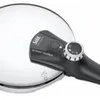 A close-up view of a pressure cooker lid and handle. Anteprima dell’immagine prodotto