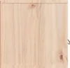 A close-up view of a wooden surface, likely a cabinet or shelf, showing the grain and texture of the wood. Produktbild-Vorschau
