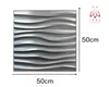 A 3D wall panel with a wavy design, shown with dimensions indicated. Produktbild-Vorschau