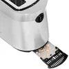A close-up view of a toaster's crumb tray, showing crumbs. Produktbild-Vorschau