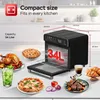 A multi-functional oven is displayed with various food items around it, showcasing its versatility. Náhľad obrázku produktu