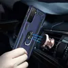 A hand holding a blue phone case with a ring holder, near a car's air vent with a magnetic phone mount. Produktbild-Vorschau