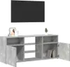 A TV cabinet with open shelves and two doors, one of which is open, displaying books inside. A framed picture and a small plant are on top of the cabinet. Produktbild-Vorschau