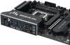 A close-up, angled view of a computer motherboard with its I/O shield visible. Produktbild-Vorschau