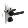 A close-up view of a black and silver door lock mechanism with measurement indicators. Produktbild-Vorschau