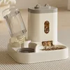 A close-up shot of an automatic pet feeder and water dispenser. Produktbild-Vorschau
