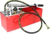 A red manual pressure testing pump with a hose and gauge. Náhľad obrázku produktu