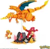 A set of Mega Pokémon building blocks featuring Charizard, Charmeleon, and Charmander in a volcanic setting. Náhled obrázku produktu