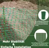 A green safety fence is shown in front of a pile of dirt, with text and diagrams explaining its features and accessories. Produktbild-Vorschau