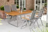 An outdoor patio setting with a dining set. Náhled obrázku produktu