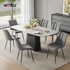 A dining room set with a table and chairs, decorated with flowers and fruit. Produktbild-Vorschau