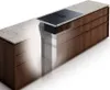 A modern kitchen island with a built-in induction cooktop and downdraft ventilation system. Podgląd zdjęcia produktu