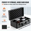 An open black storage case for cards, with foam padding inside the lid and dividers in the base. Several stacks of cards are visible in the base. Anteprima dell’immagine prodotto