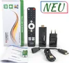 A product shot of an Android TV box, its remote, power adapter, cables, and packaging, along with batteries and instructions. Anteprima dell’immagine prodotto