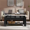 A living room scene with a couch and a coffee table. Produktbild-Vorschau