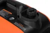 Close-up of the top of an orange and black portable generator. Anteprima dell’immagine prodotto