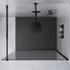 A modern, minimalist shower enclosure with a black frame and clear glass. Produktbild-Vorschau