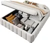 A storage bed with its lid open, revealing stored items like pillows, boxes, and a stuffed toy. Anteprima dell’immagine prodotto
