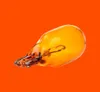 A single amber-colored light bulb is shown against an orange background. Produktbild-Vorschau