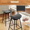 Two black bar stools are shown in a kitchen setting, with close-up insets highlighting the material and cushioning. Podgląd zdjęcia produktu