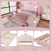 A pink princess-style bed with a crown-shaped headboard and LED lighting, shown in a bedroom setting and with close-up details of its features. Náhled obrázku produktu