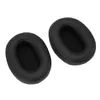 Two black ear pads are shown against a white background. Produktbild-Vorschau