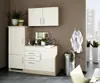A compact kitchen unit with cabinets, sink, and appliances, set against a brown wall with a window view in the background. Produktbild-Vorschau