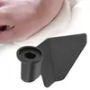 A close-up of a black bread maker paddle in front of a blurred background of dough. Produktbild-Vorschau