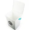 A white storage box designed to look like a washing machine, with the lid open. Produktbild-Vorschau
