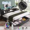 A bed with a headboard featuring LED lighting and storage compartments, shown with a smartphone displaying a color wheel and a remote control. Náhled obrázku produktu