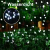 String lights are shown in a garden setting during a rain shower, with text indicating they are waterproof. Produktbild-Vorschau