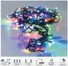 A tangled string of colorful LED lights on a reflective surface. Produktbild-Vorschau
