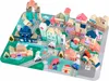 A colorful wooden block city playset with buildings, roads, and vehicles arranged on a play mat. Náhled obrázku produktu