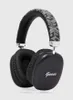 A pair of black GUESS wireless headphones with a patterned headband. Produktbild-Vorschau