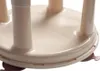 A close-up view of the base of a beige baby bathtub seat, showing its legs and the underside of the seat. Produktbild-Vorschau