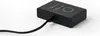 A black electronic device with the word 'OFF' embossed on its surface, connected to a black cable. Náhled obrázku produktu