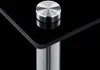 A close-up shot of the corner of a black glass shelf with a silver support pole and a silver decorative cap. Náhled obrázku produktu