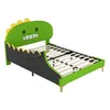 A children's bed designed to look like a dinosaur, shown from a side angle on a white background. Produktbild-Vorschau