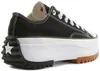 A side view of a black Converse Run Star Hike Ox sneaker with a thick white platform sole and a brown rubber sole. Podgląd zdjęcia produktu