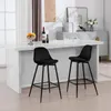 Two black bar stools are placed in front of a white marble kitchen island. Produktbild-Vorschau