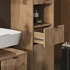 A close-up view of a wooden bathroom cabinet with a sink. Náhled obrázku produktu