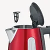 A close-up view of a red electric kettle with its lid open and a filter removed. Anteprima dell’immagine prodotto