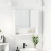 A white bathroom cabinet with a mirror mounted on a tiled wall. Náhľad obrázku produktu