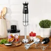 A kitchen counter with a hand blender set and ingredients. Produktbild-Vorschau