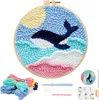 A punch needle embroidery kit with a whale design. Produktbild-Vorschau